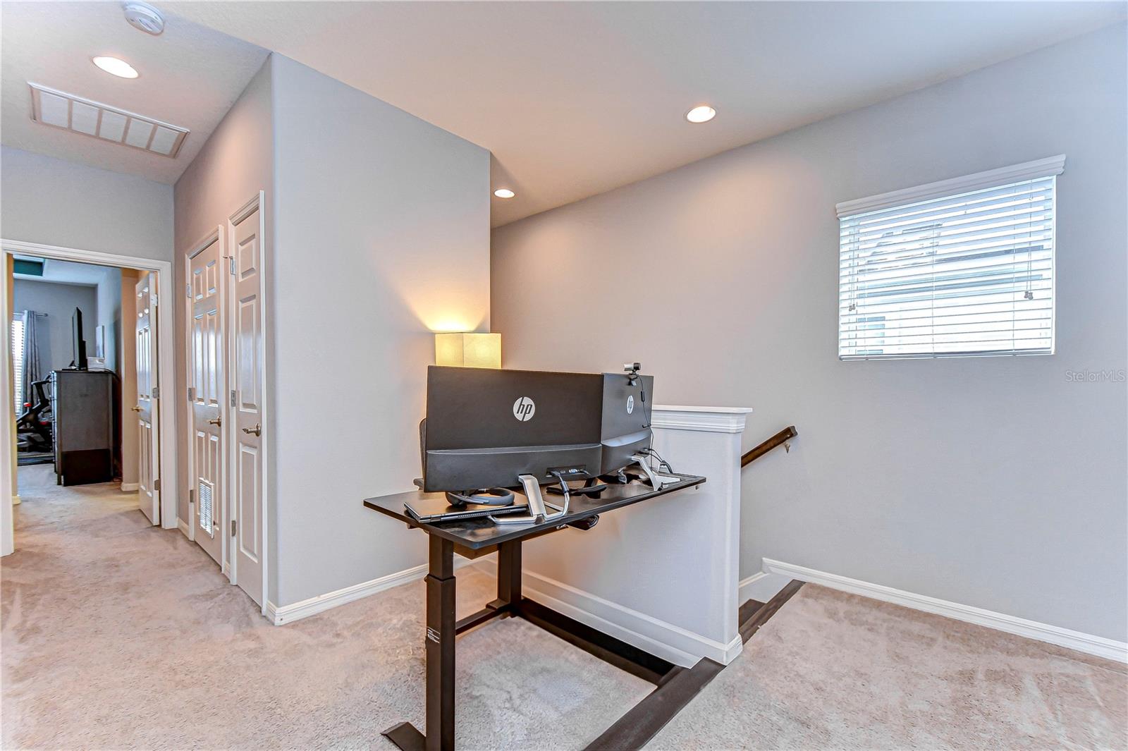 Cozy workspace on the upper landing.