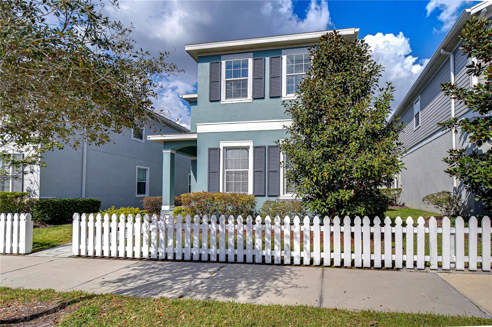 Charming home with classic picket fence.