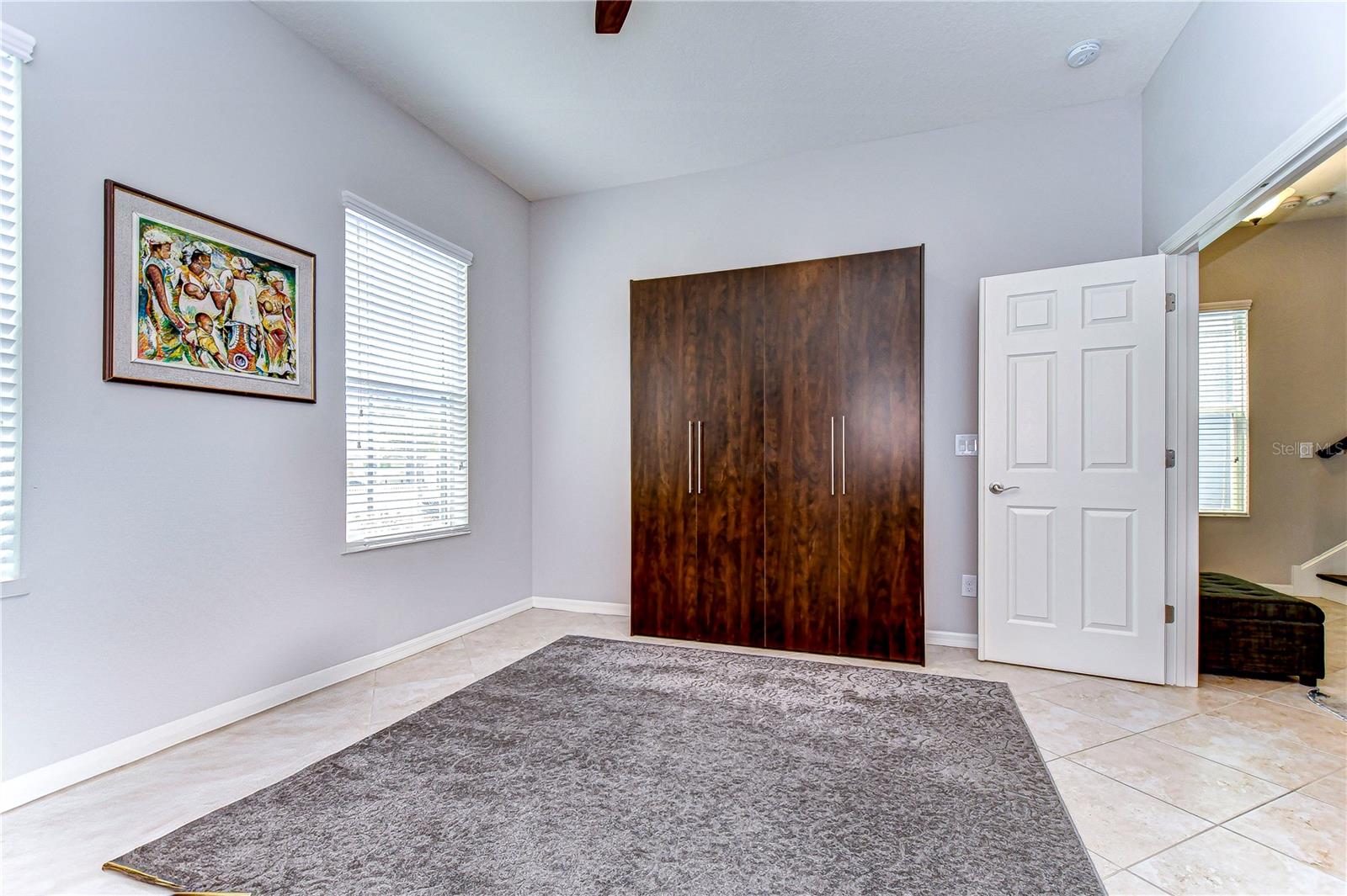 Double windows bathe the room in natural lighting!