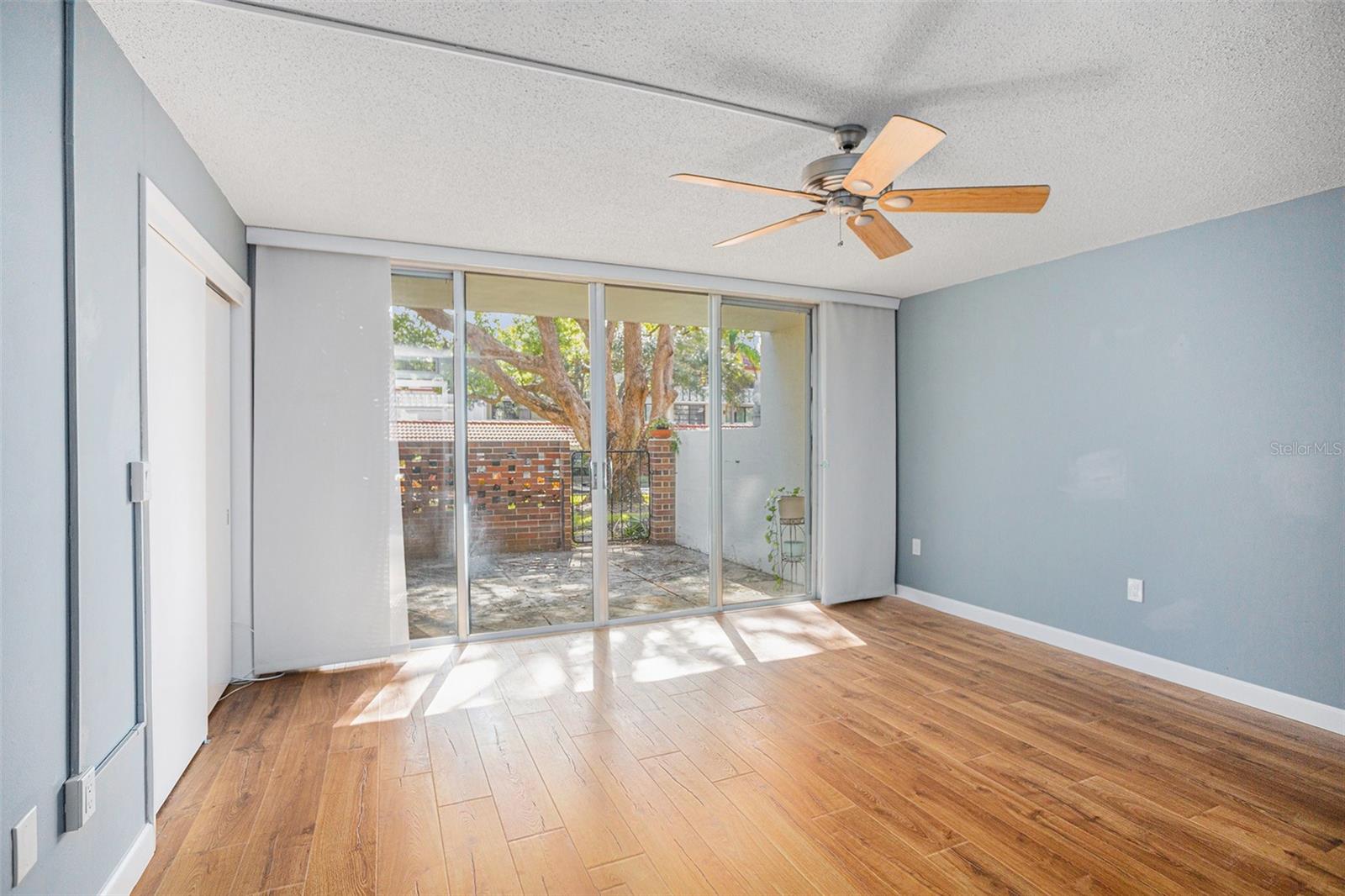 Lots of natural light coming from the patio off of the primary bedroom