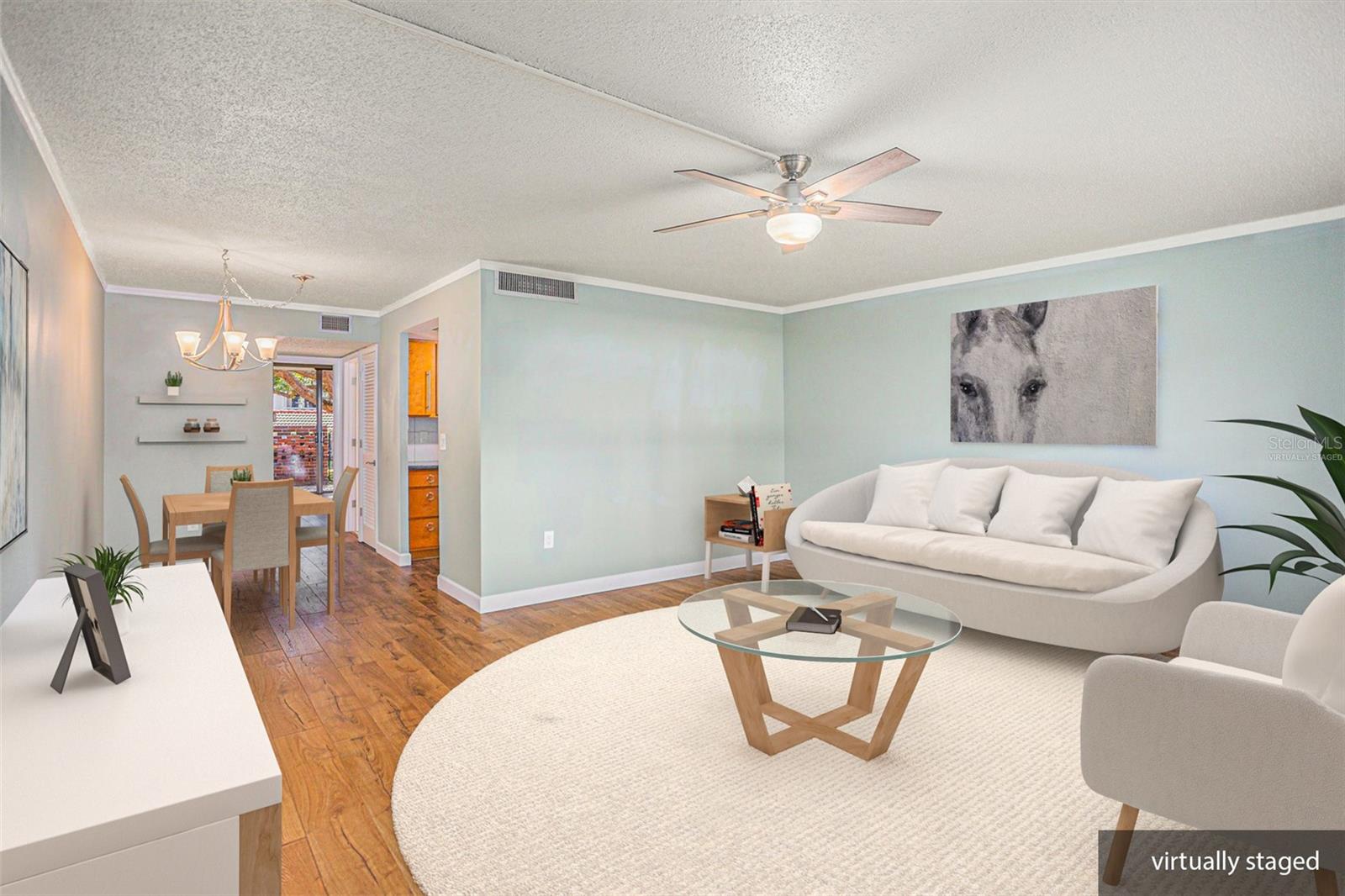 Virtually Staged.  Living Room into Dining Room