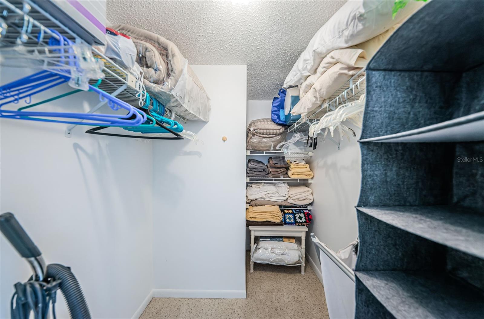 Spacious walk-in closet in master bedroom