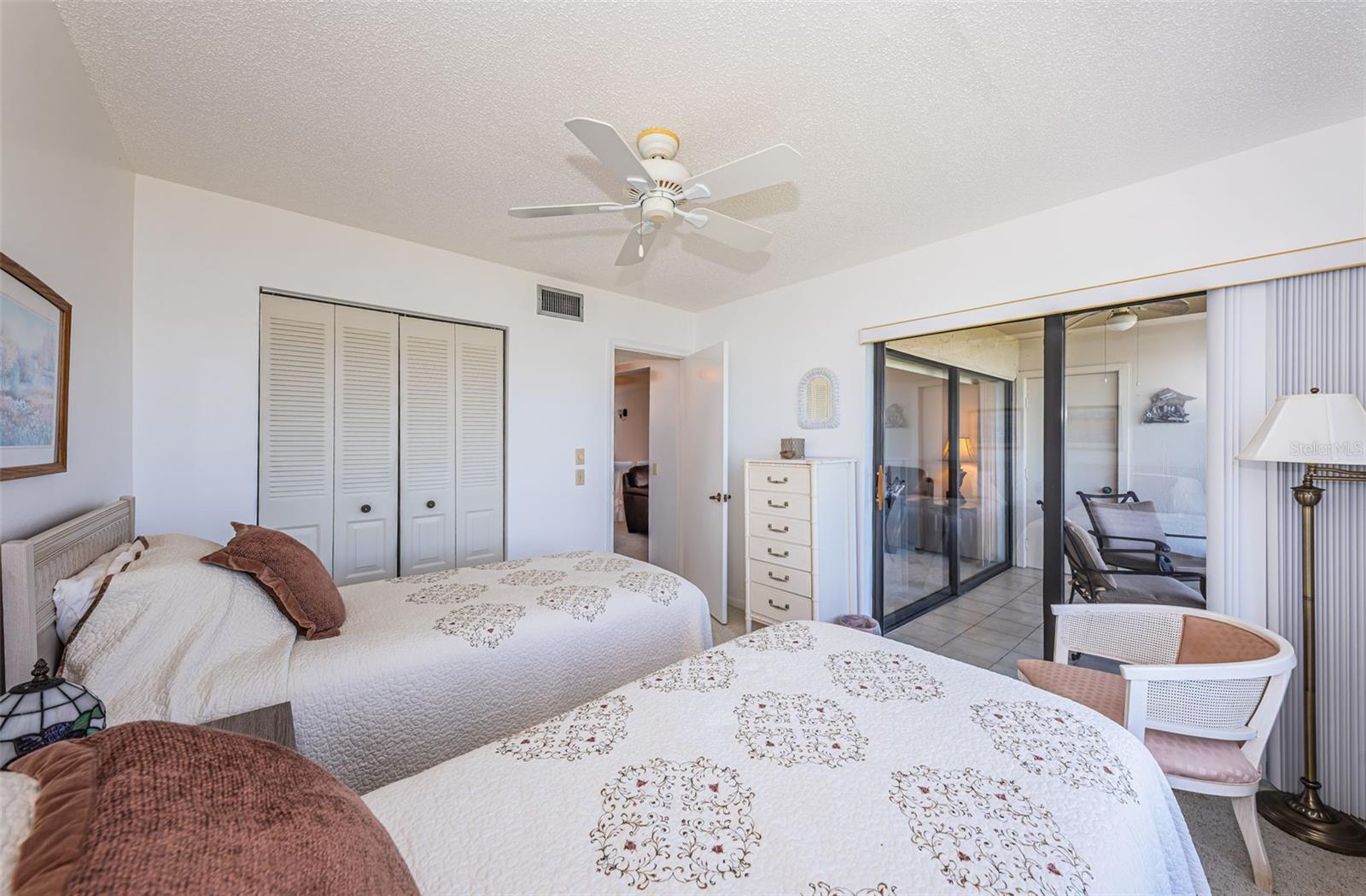 Guest bedroom has access to the balcony