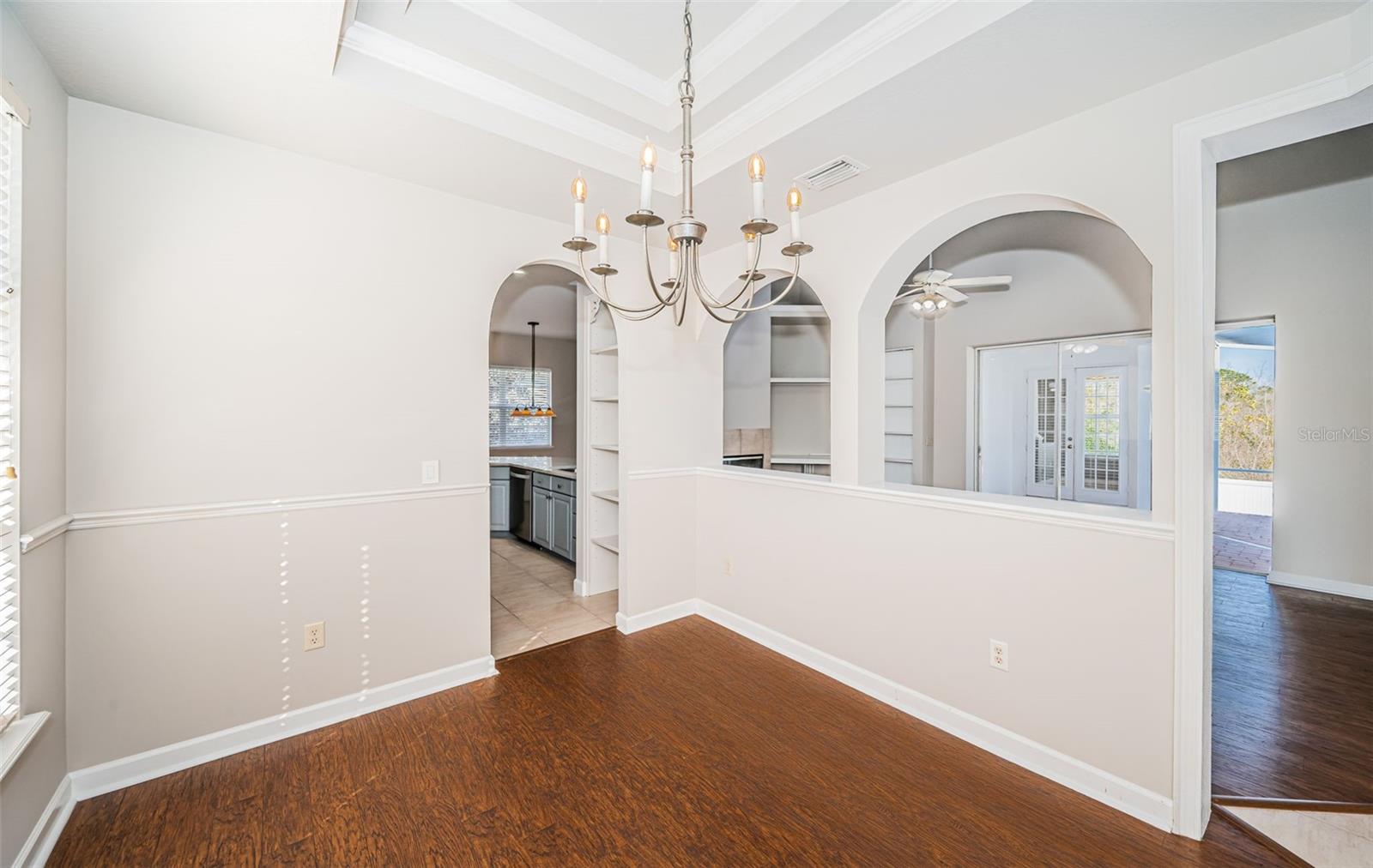 Dining Room with tray ceiling.