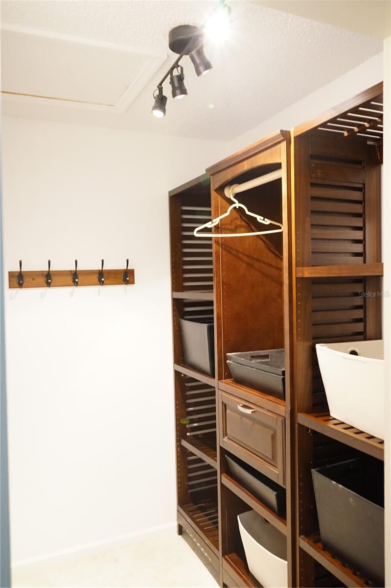 closet with built in shelves