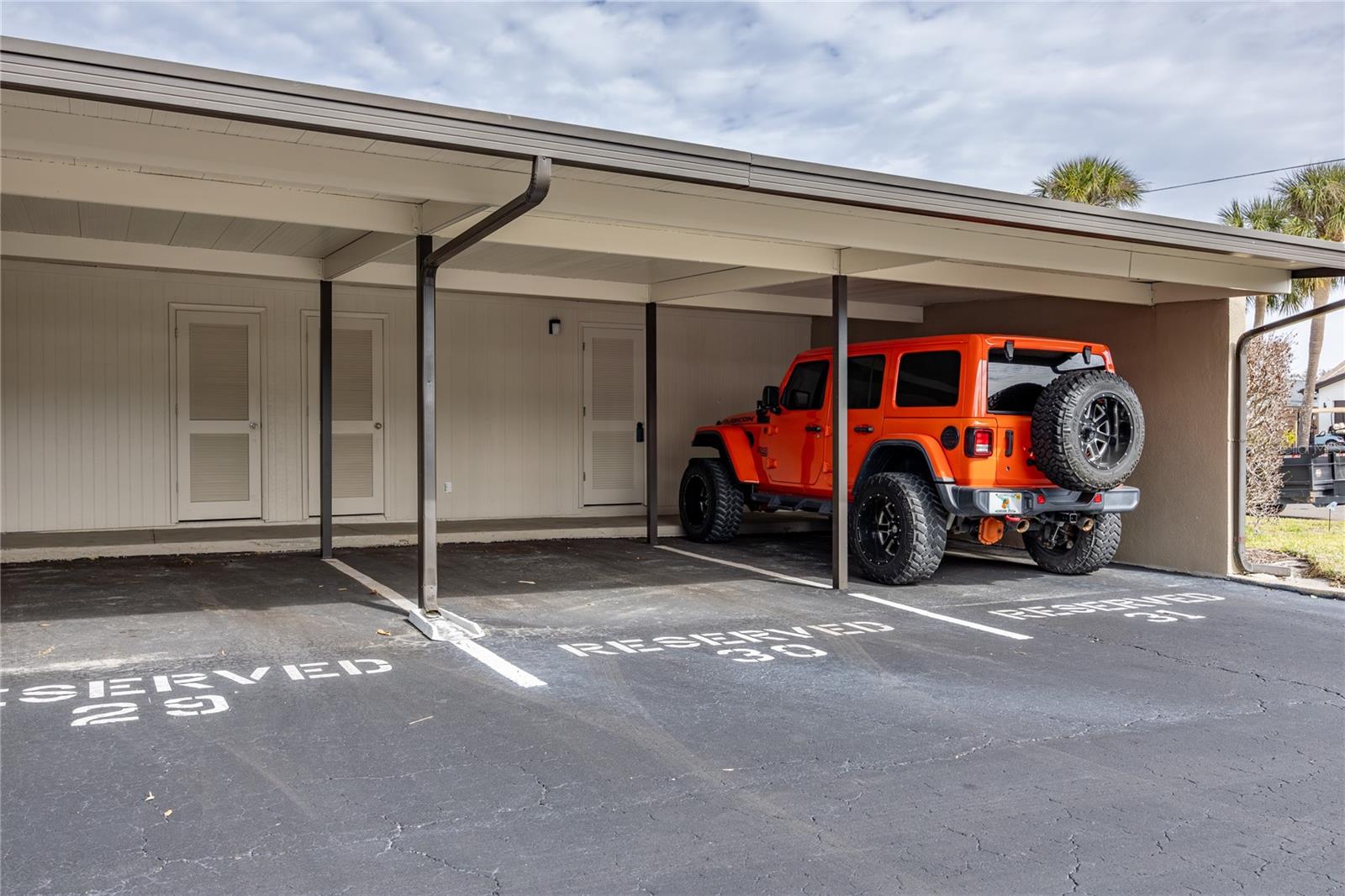 Assigned covered parking space with Storage Closet.