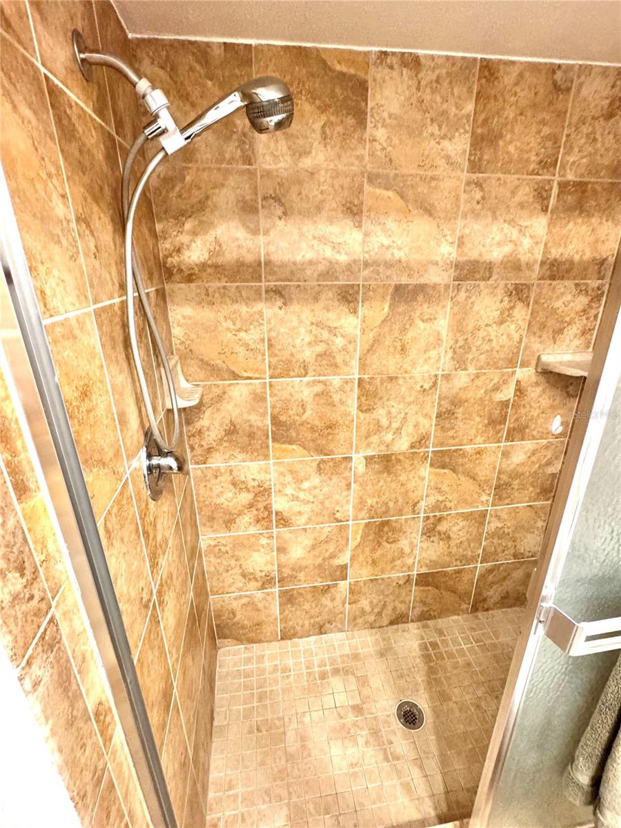 Updated ceramic tile in shower.