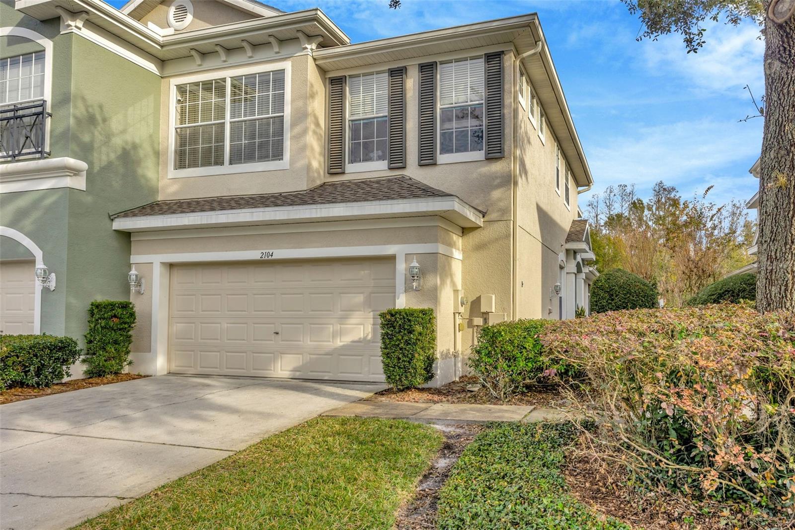 Welcome Home-2 car garage with a large driveway