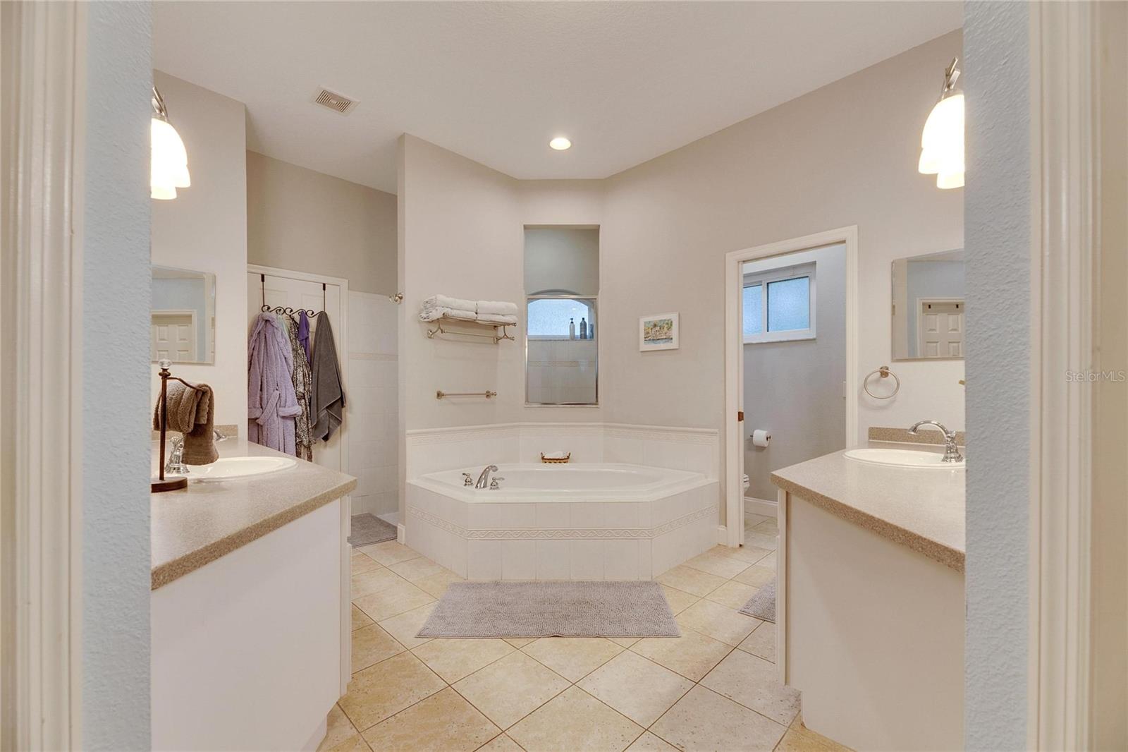 Primary Bath with Tub and Walk in Shower