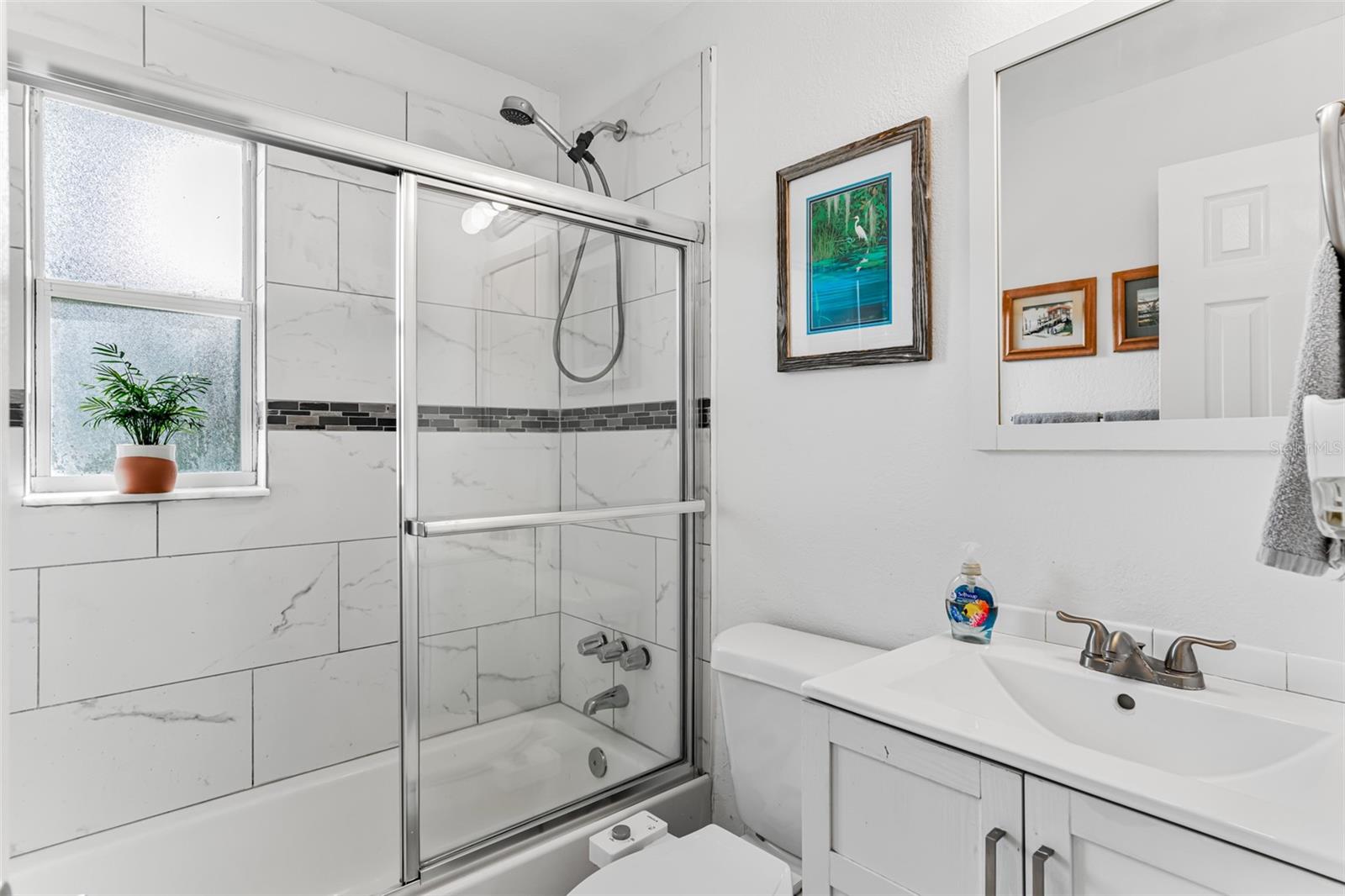 Bathroom with shower and tub