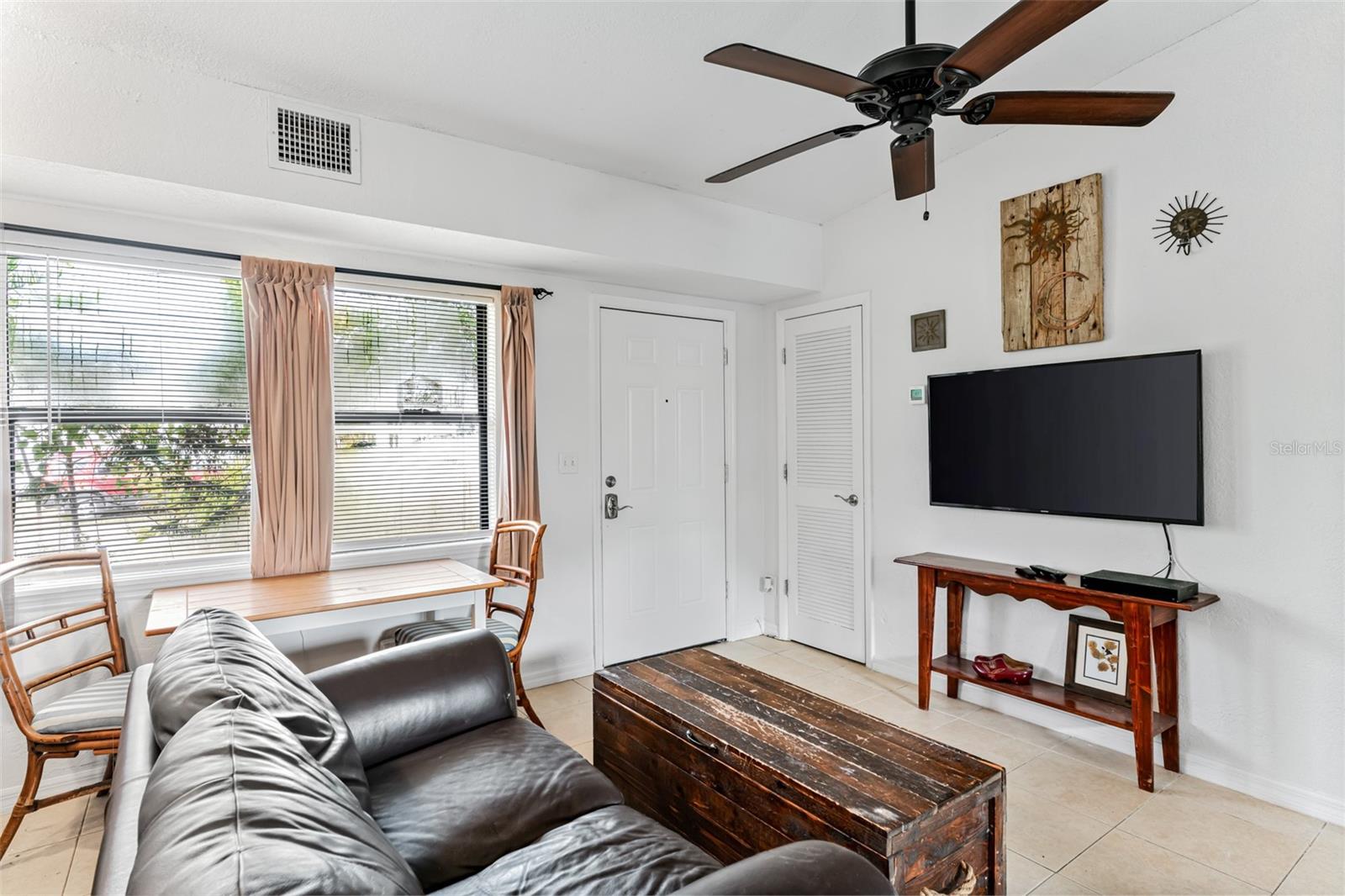 Living area with front door entrance