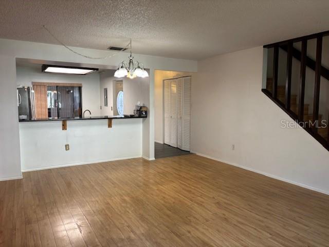 view from kitchen to dining and living rooms