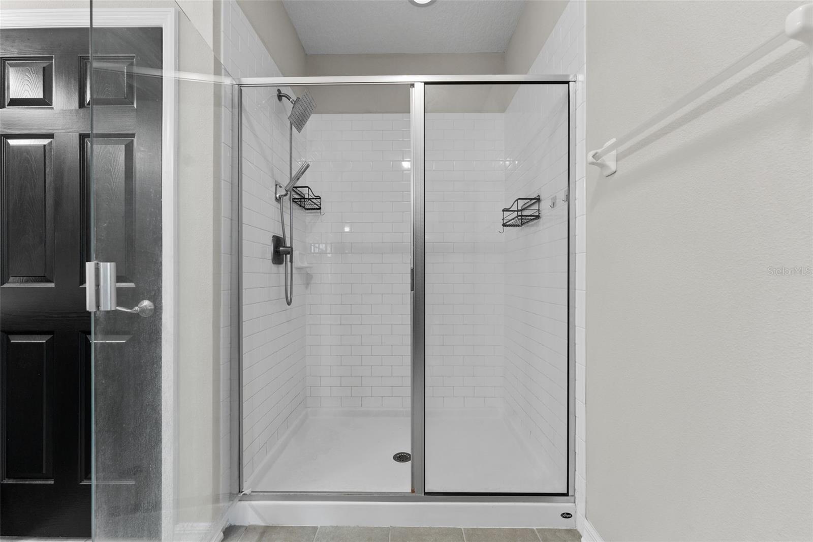 Master Shower With Designer Subway Tile, Rain Shower & Handheld Spray