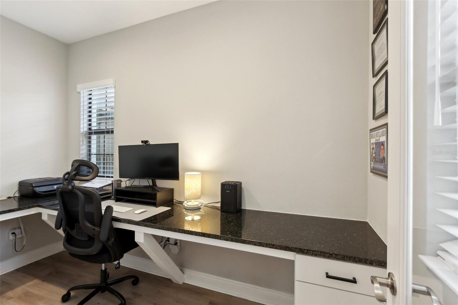 Custom built-in desk with granite counters