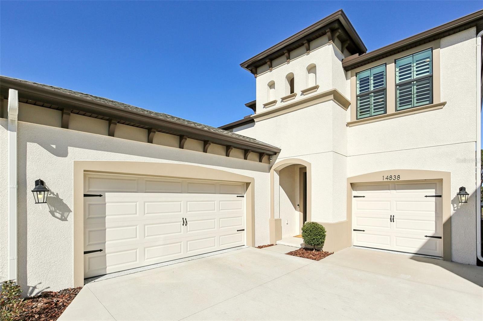 True 3-car garage with plenty of driveway space for parking.