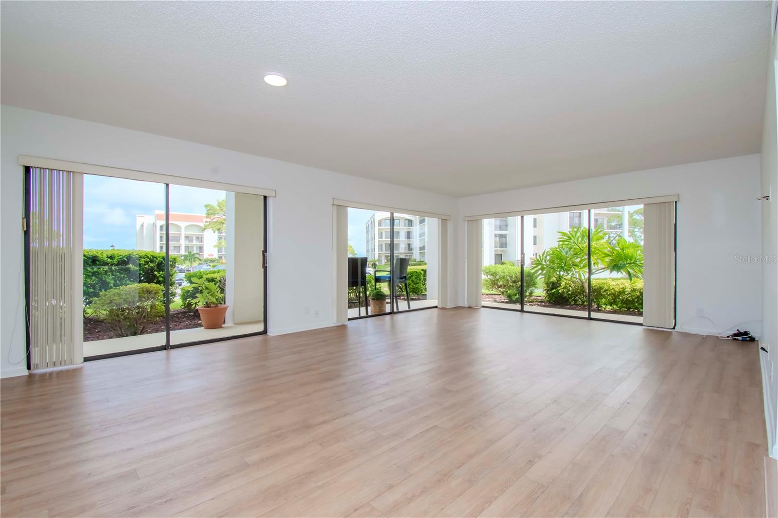 Views and natural light brighten living and dining rooms