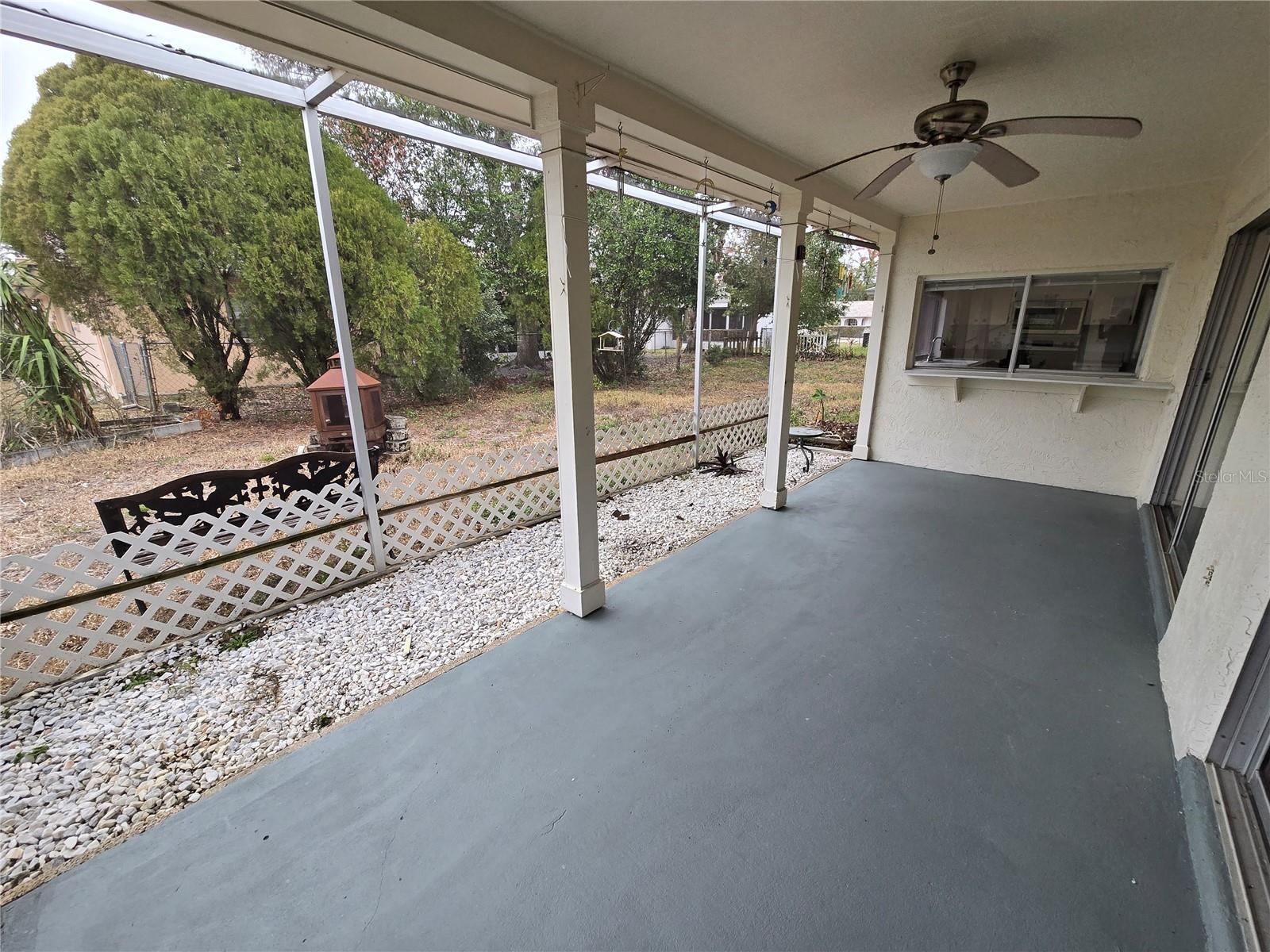 Covered screen enclosed back Patio