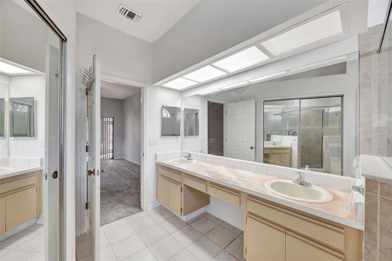 The Primary Ensuite has plenty of storage, a double sink vanity and Linen Closet.