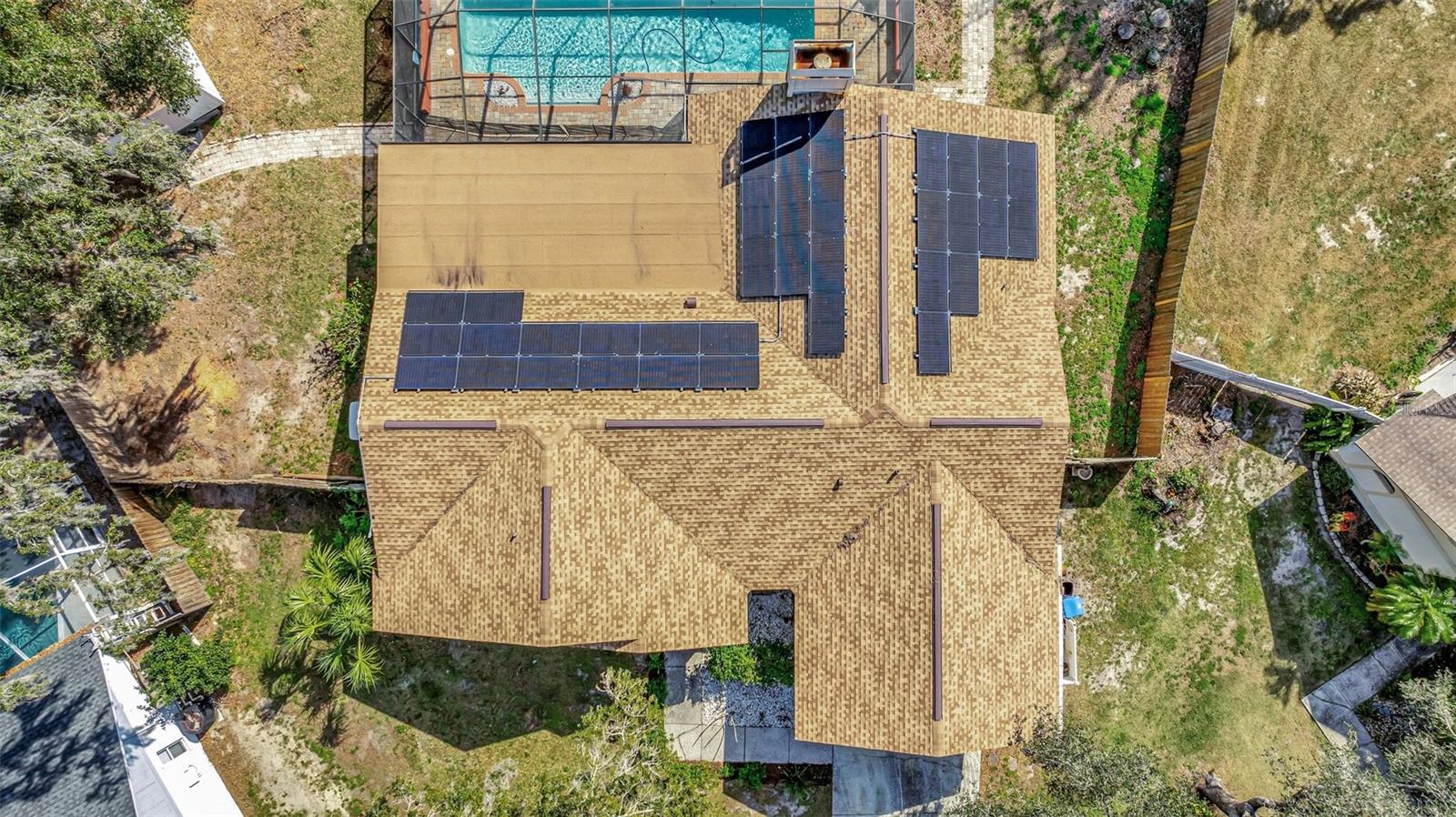 Aerial of Home showing the Solar panels and beautiful newer roof.