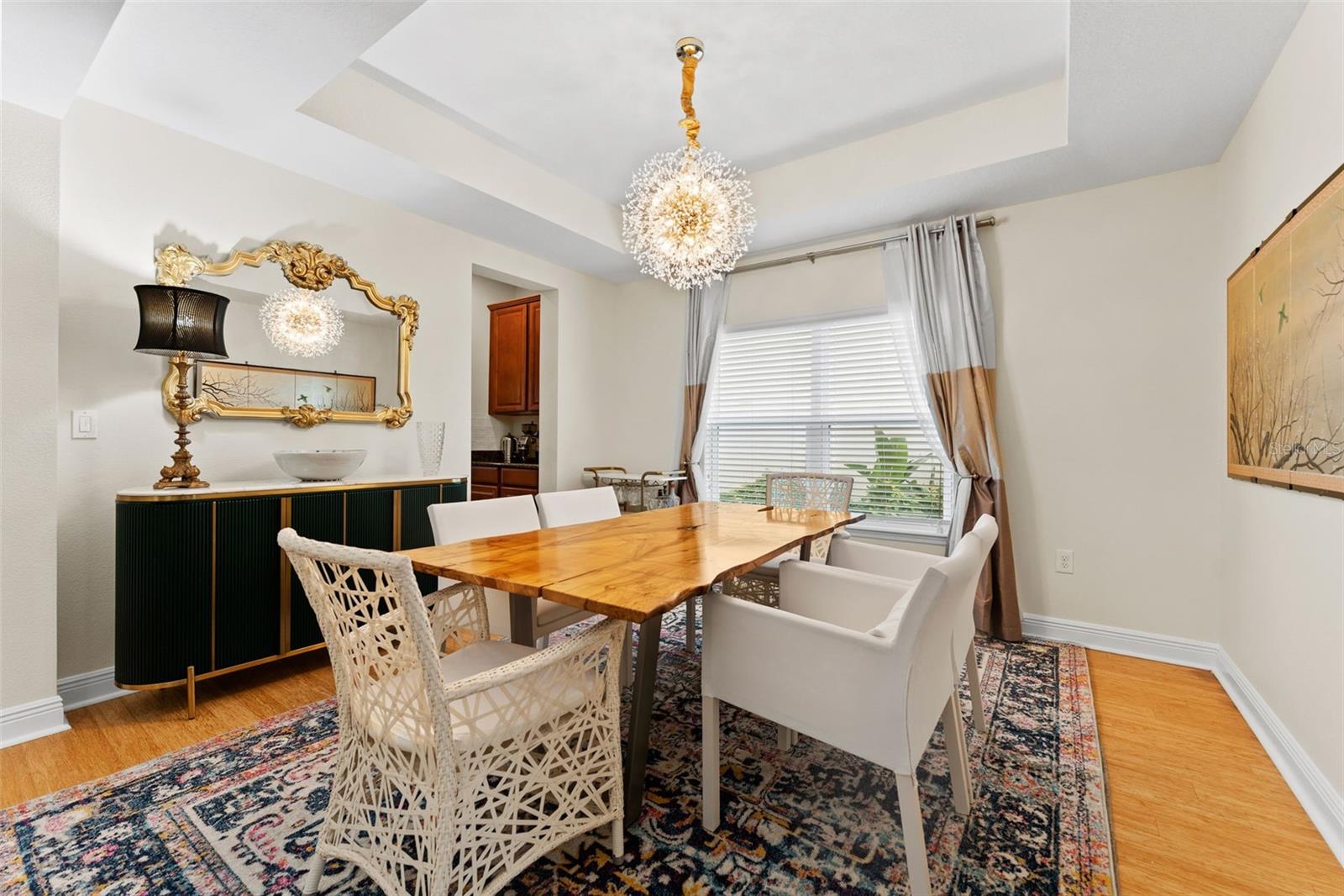 Beautiful Formal Dining Room With Tray Ceiling