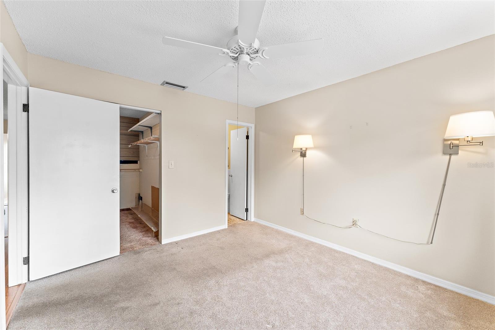 Primary Bedroom with walk-in closet