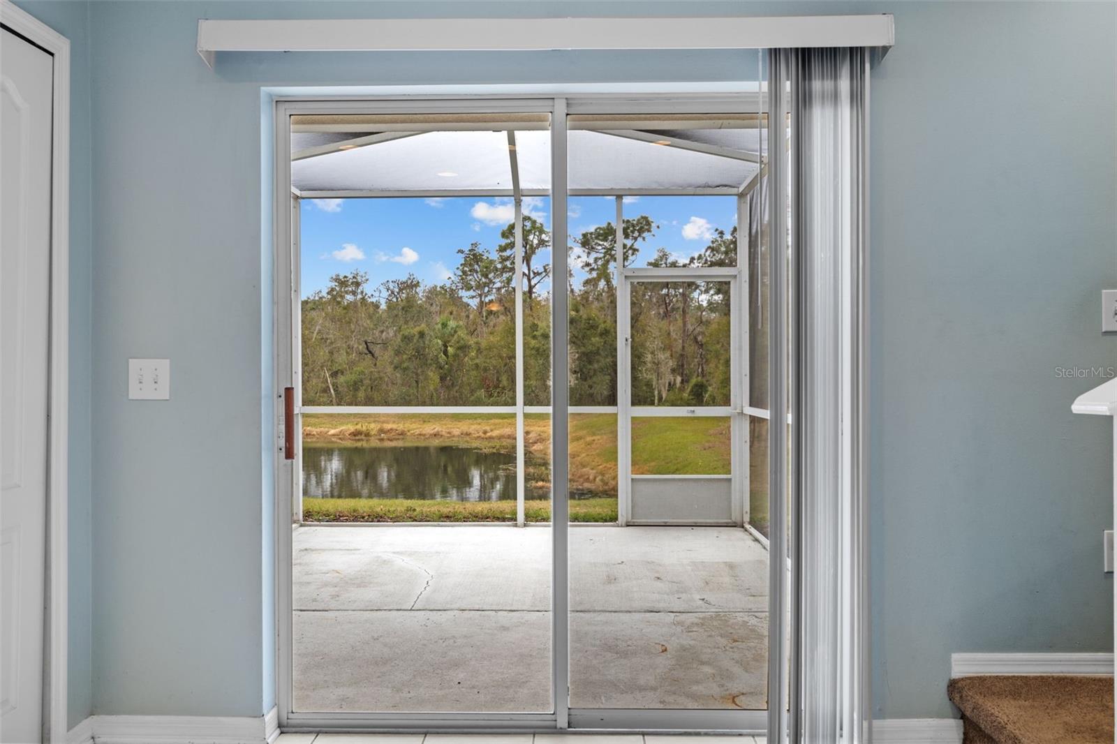 Sliding glass doors to screened lanai