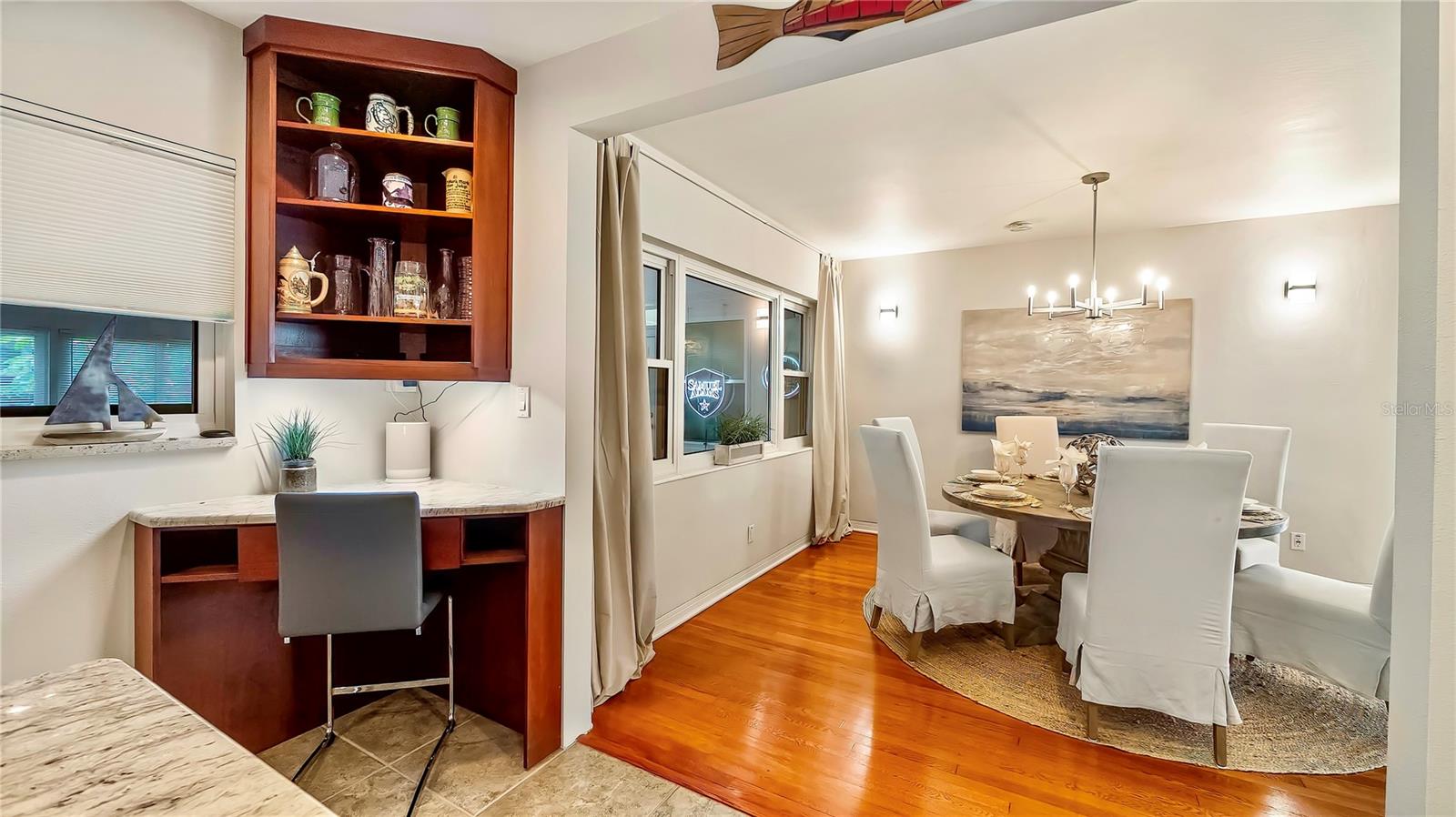 Well-appointed kitchen with ample counter space and a built-in desk area.