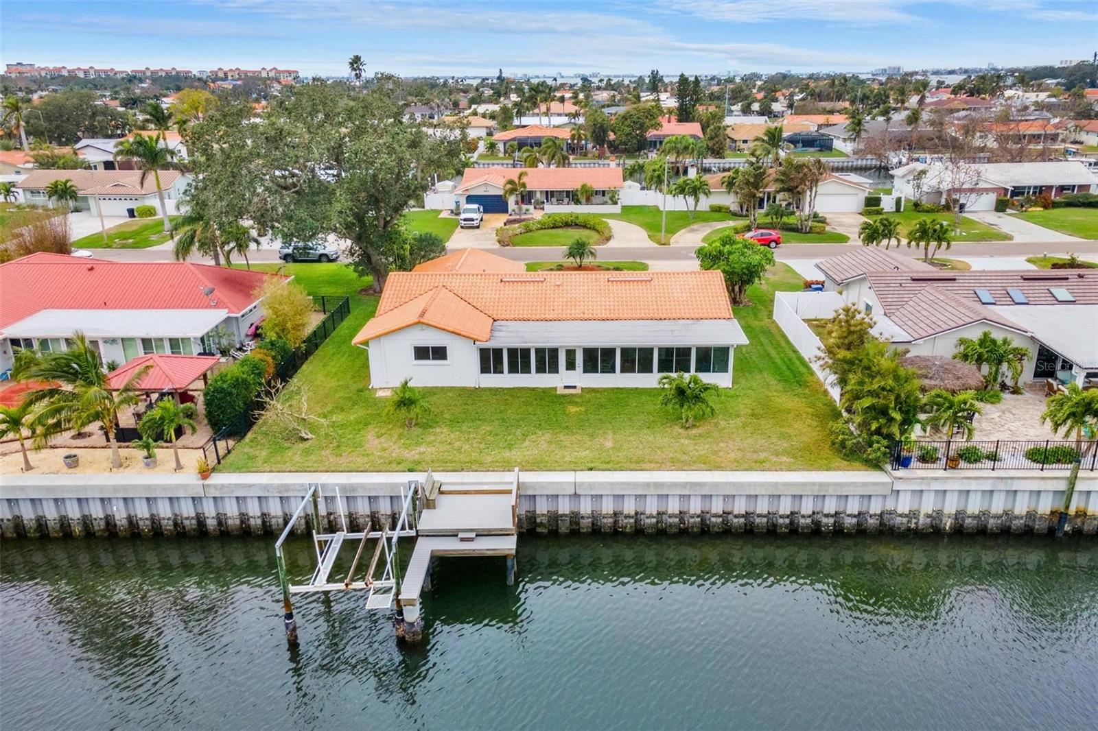 Here's an aerial look at the seawall and rear of the home.