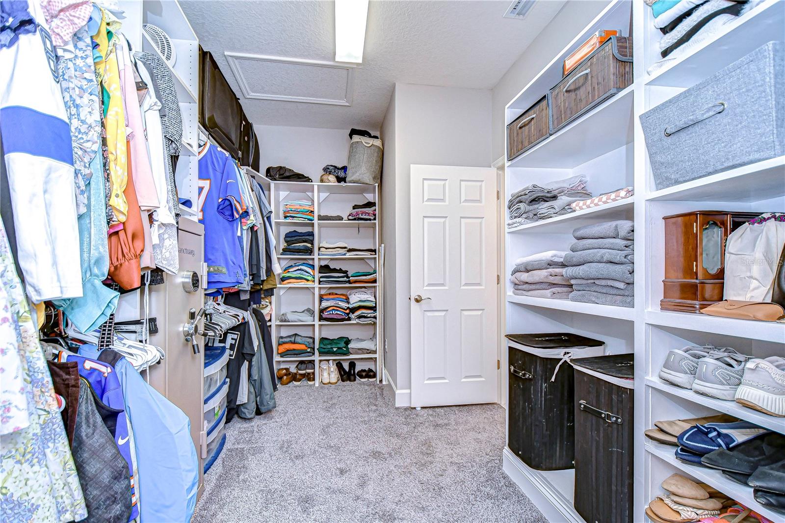 Primary closet is HUGE and features built-ins!