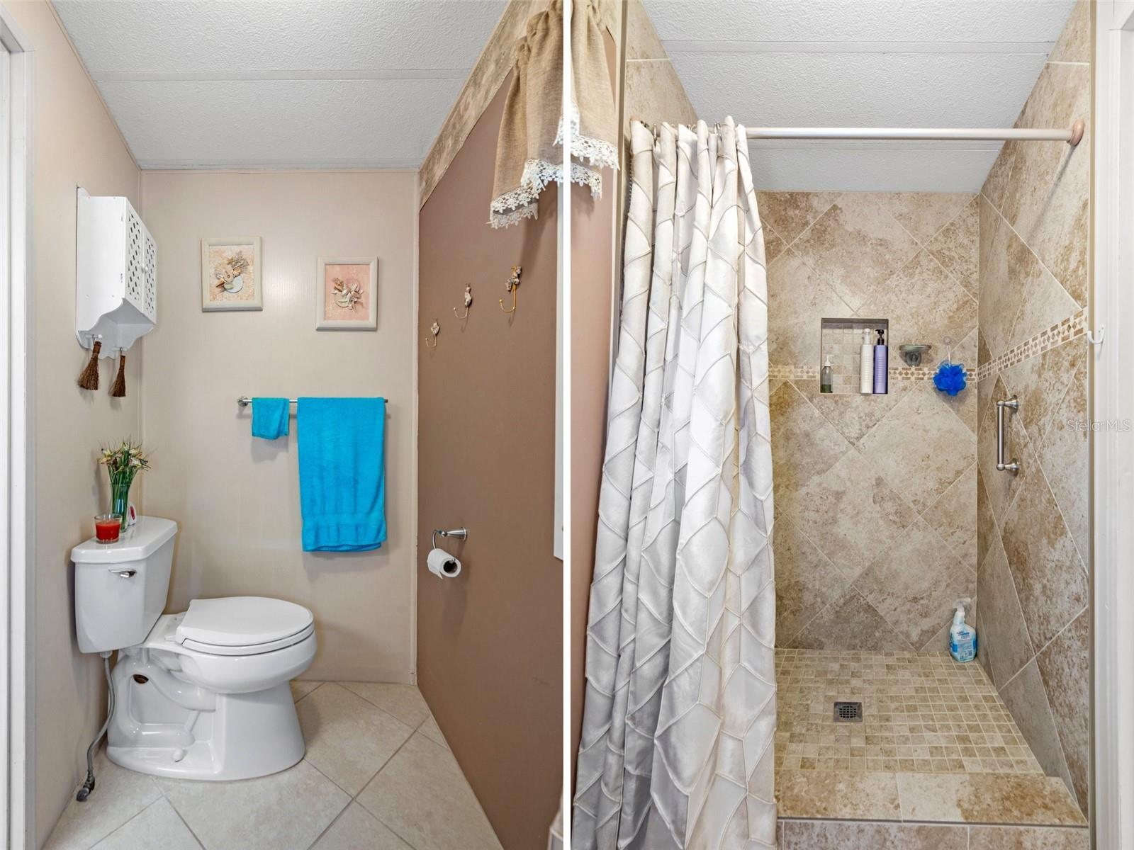 The master bathroom has a beautiful step-in shower