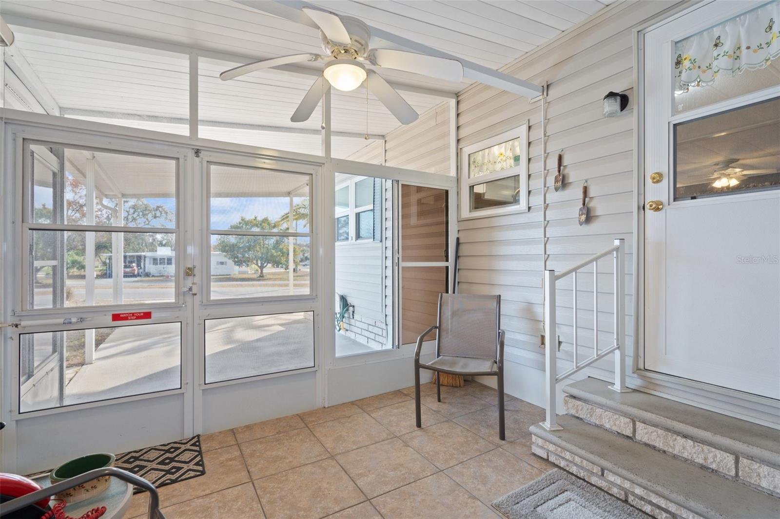 There are Levlor Blinds in the screened in porch