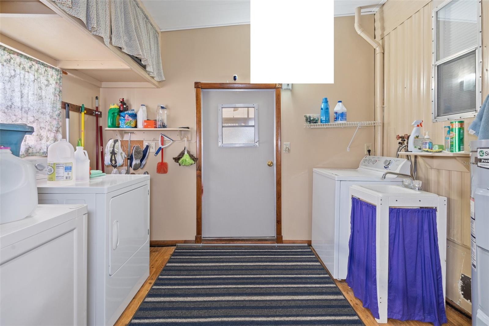 There is a sink in the Laundry Room