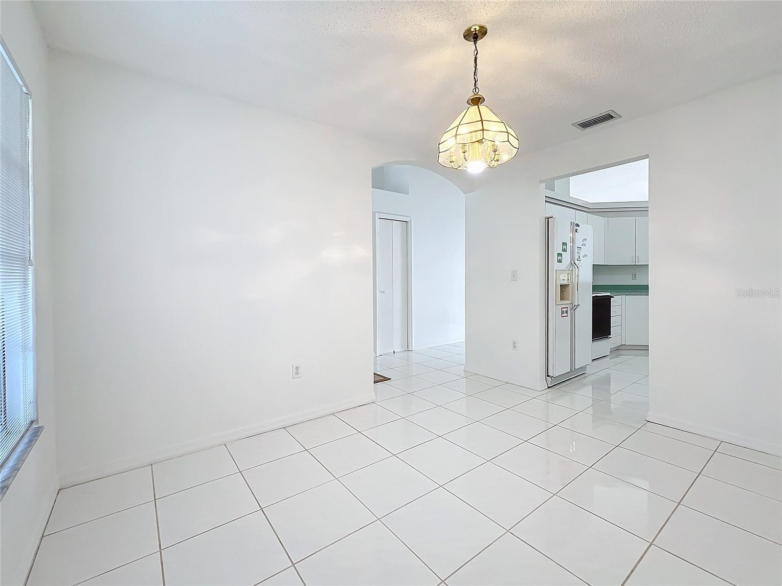 dining look at kitchen entrance