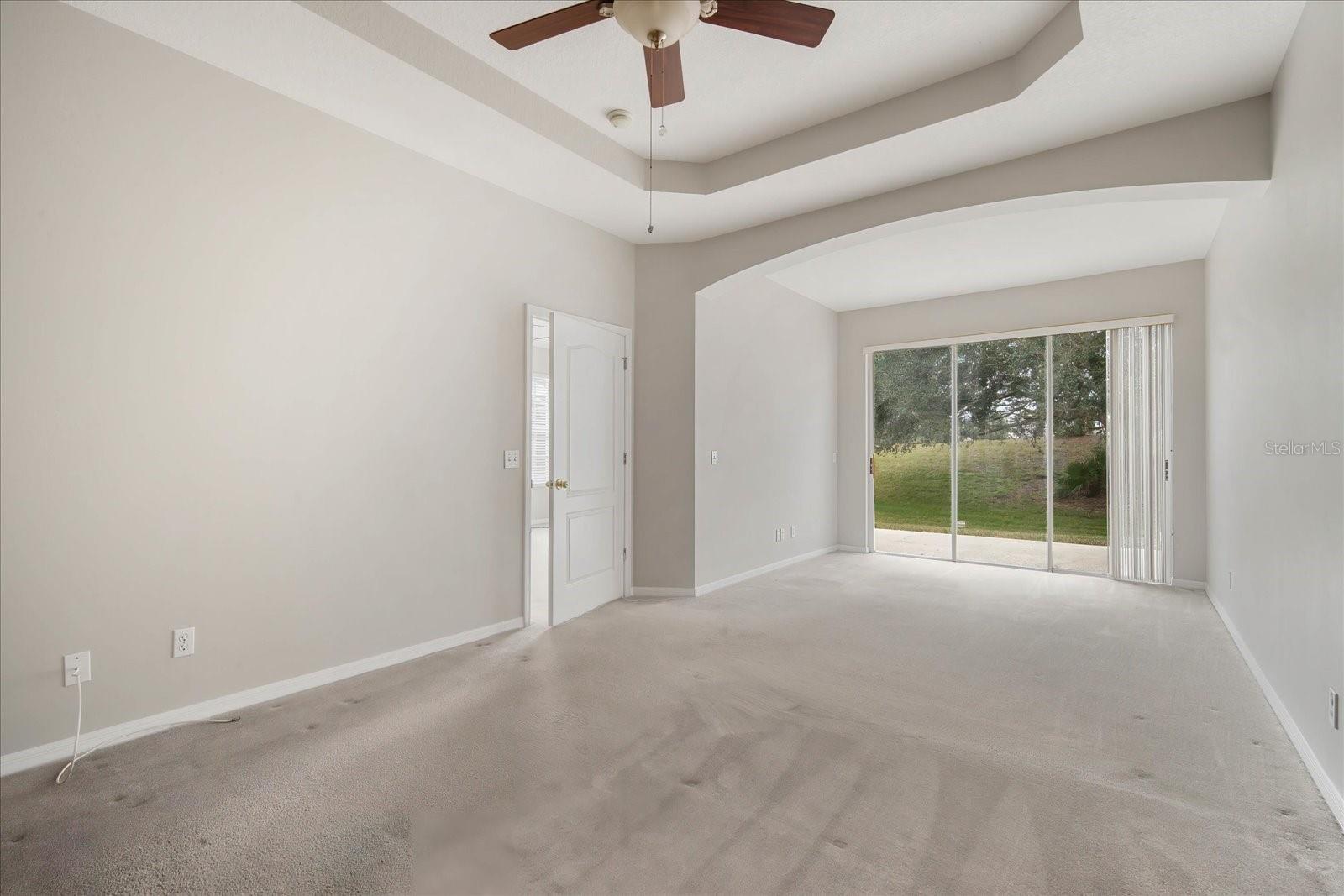 View from primary bathroom into bedroom