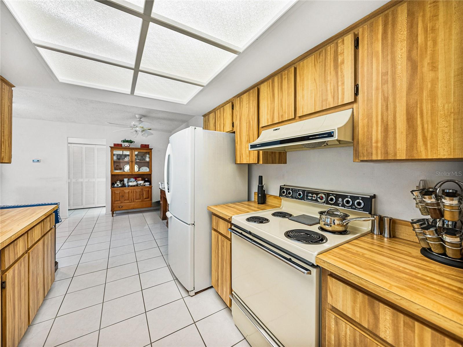 Centrally located kitchen is the heart of the home~