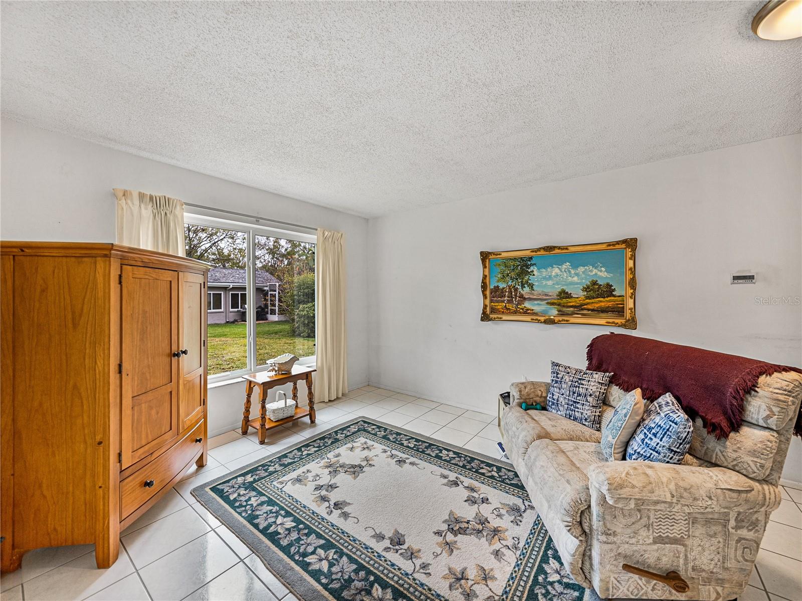 Family room nicely tucked at the back of home~