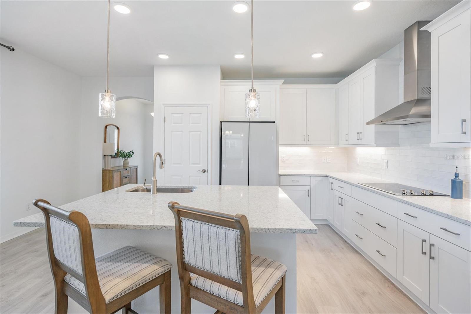 quartz countertops, upgraded cabinets