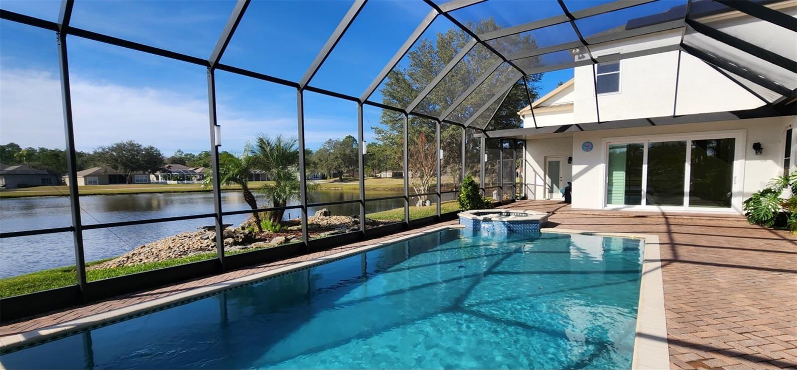 Lanai view of pool & pond 2