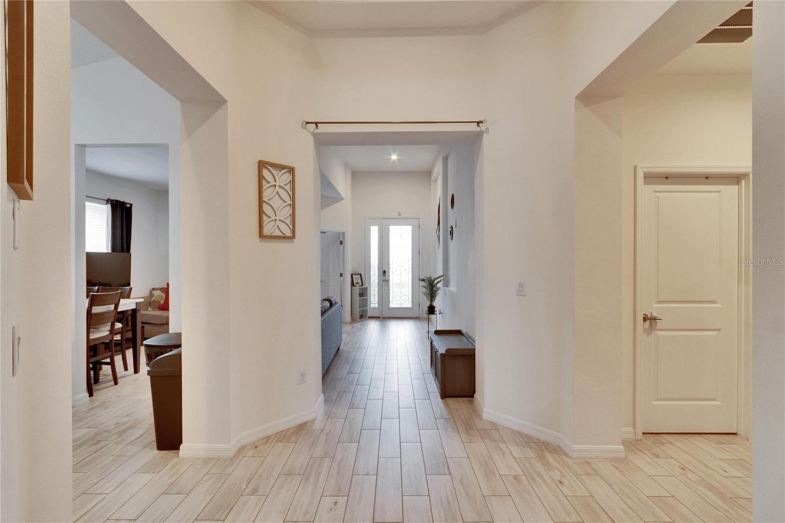 Hallway with tray ceilings