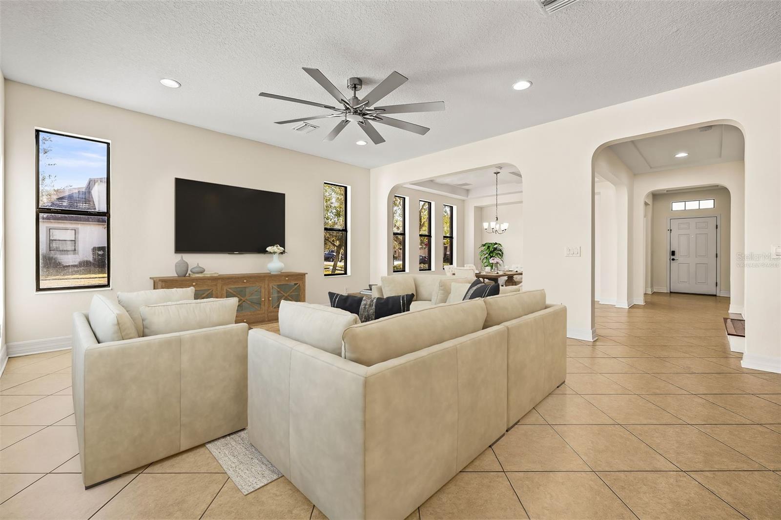 Virtually staged- Living room looking toward the dining area.