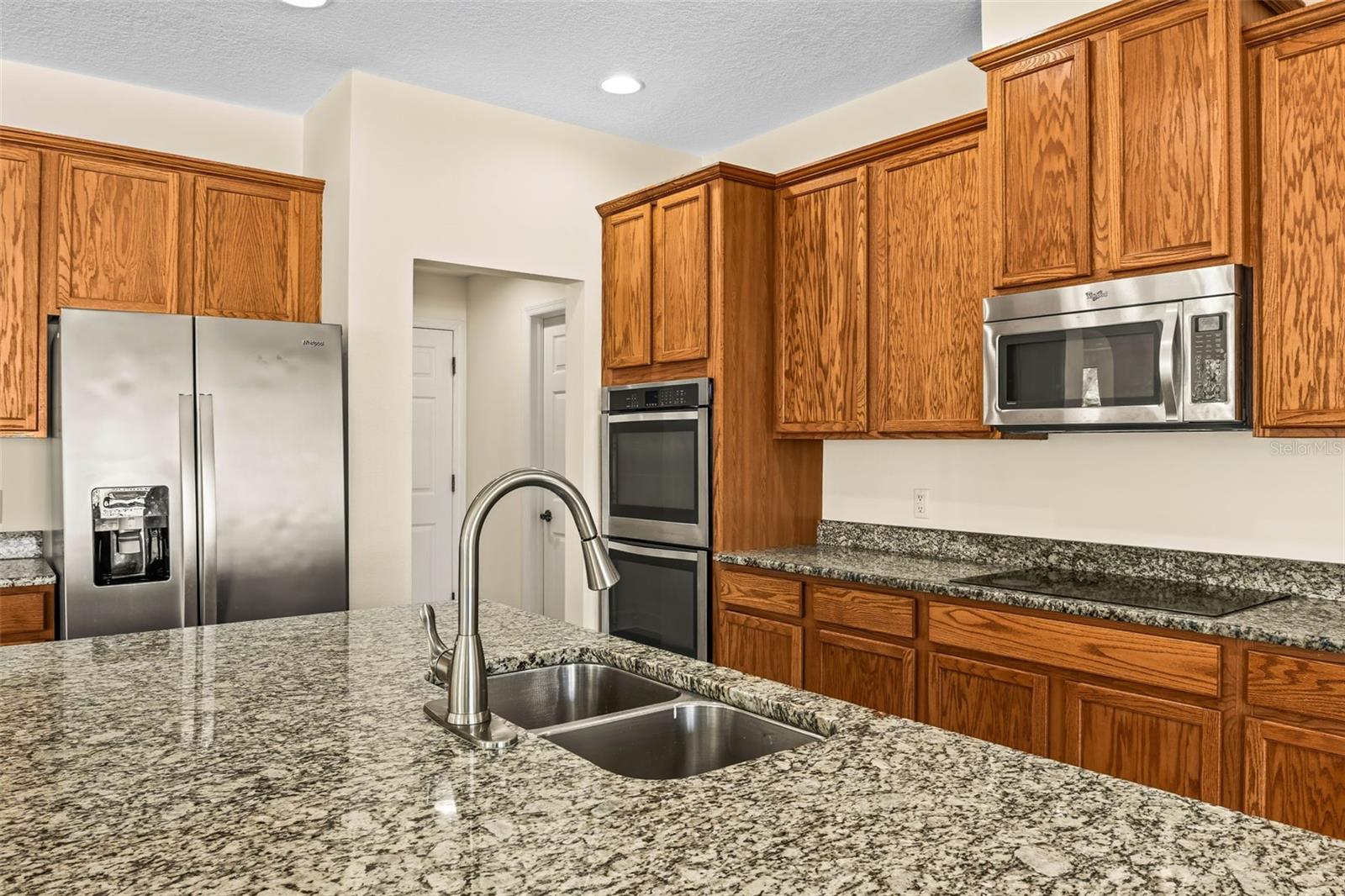 Induction cooktop, double-wall oven, tons of space.