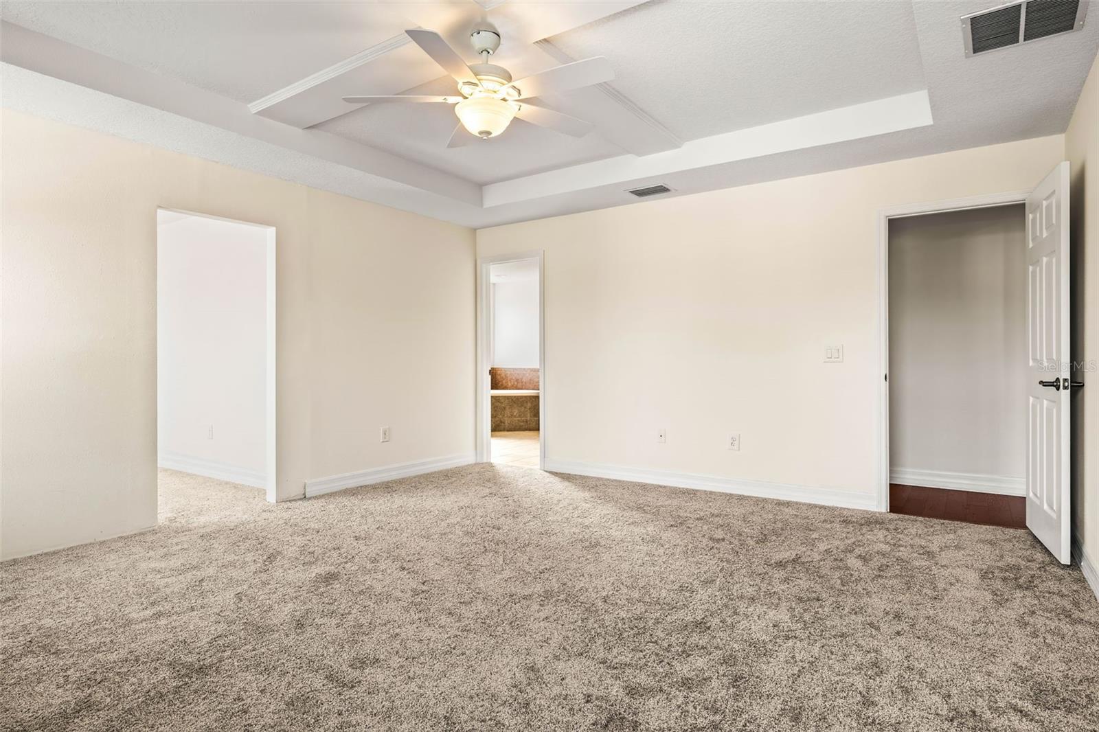 Primary suite shown unfurnished