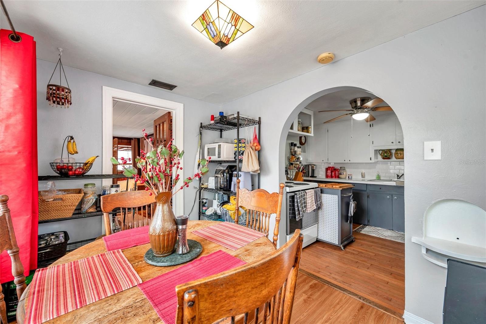 Dining Room Looking into Kitchen and Sun Room