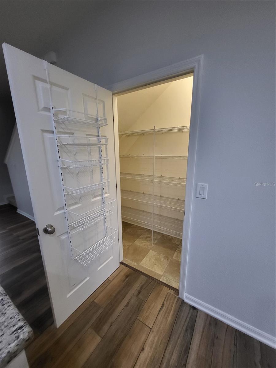 Conveniently located storage room/pantry