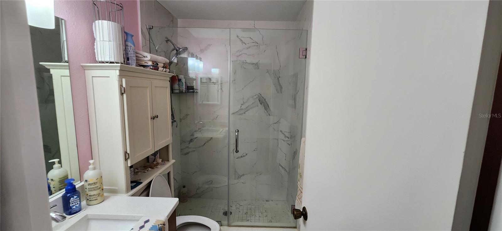 Recently renovated bathroom with walkin