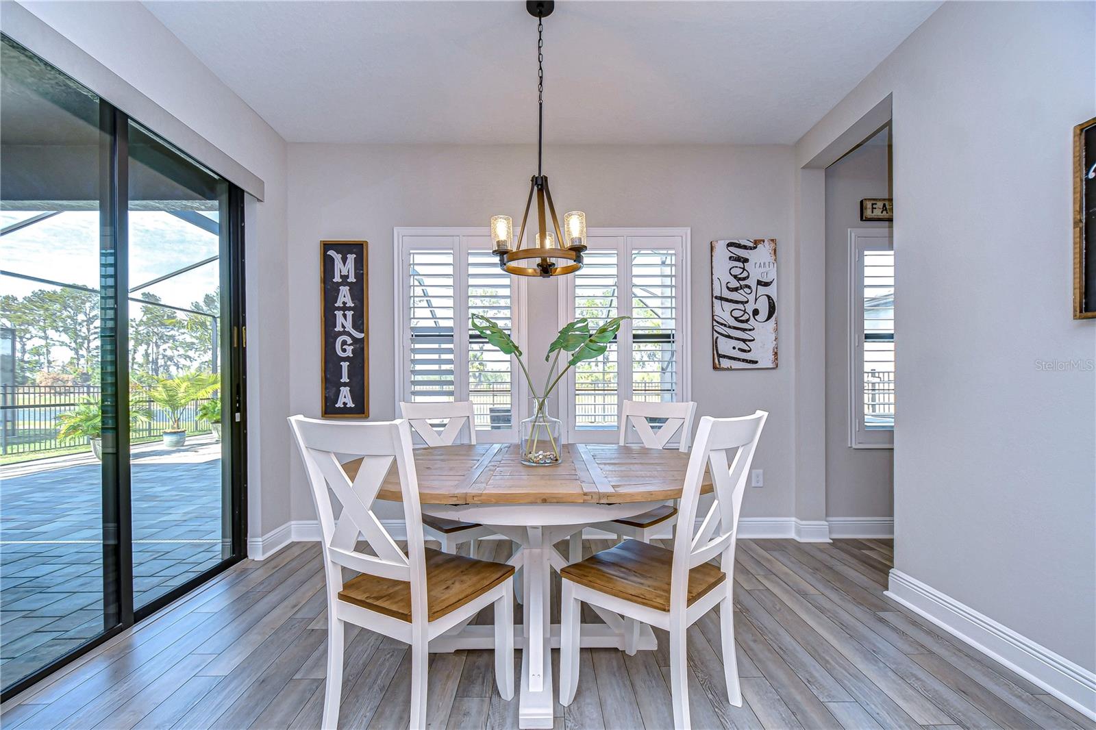 Dining area is beautiful and features additional sliders to enjoy your meal with a view.