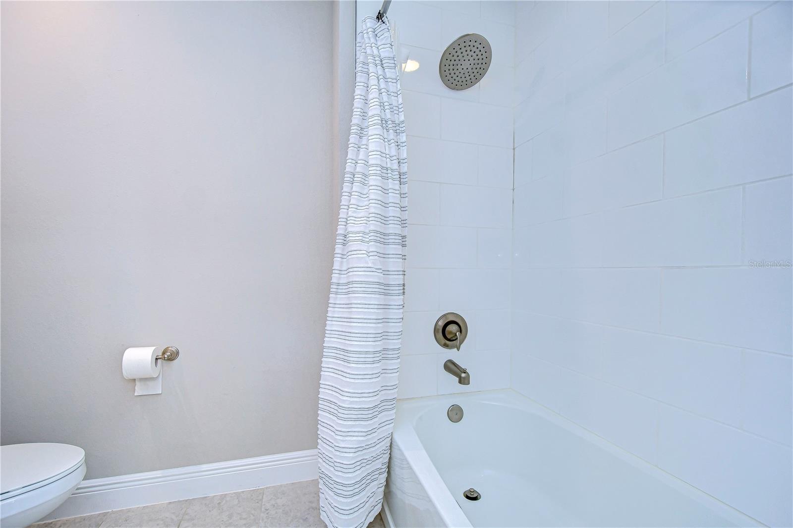 Tub and shower available in third bath!