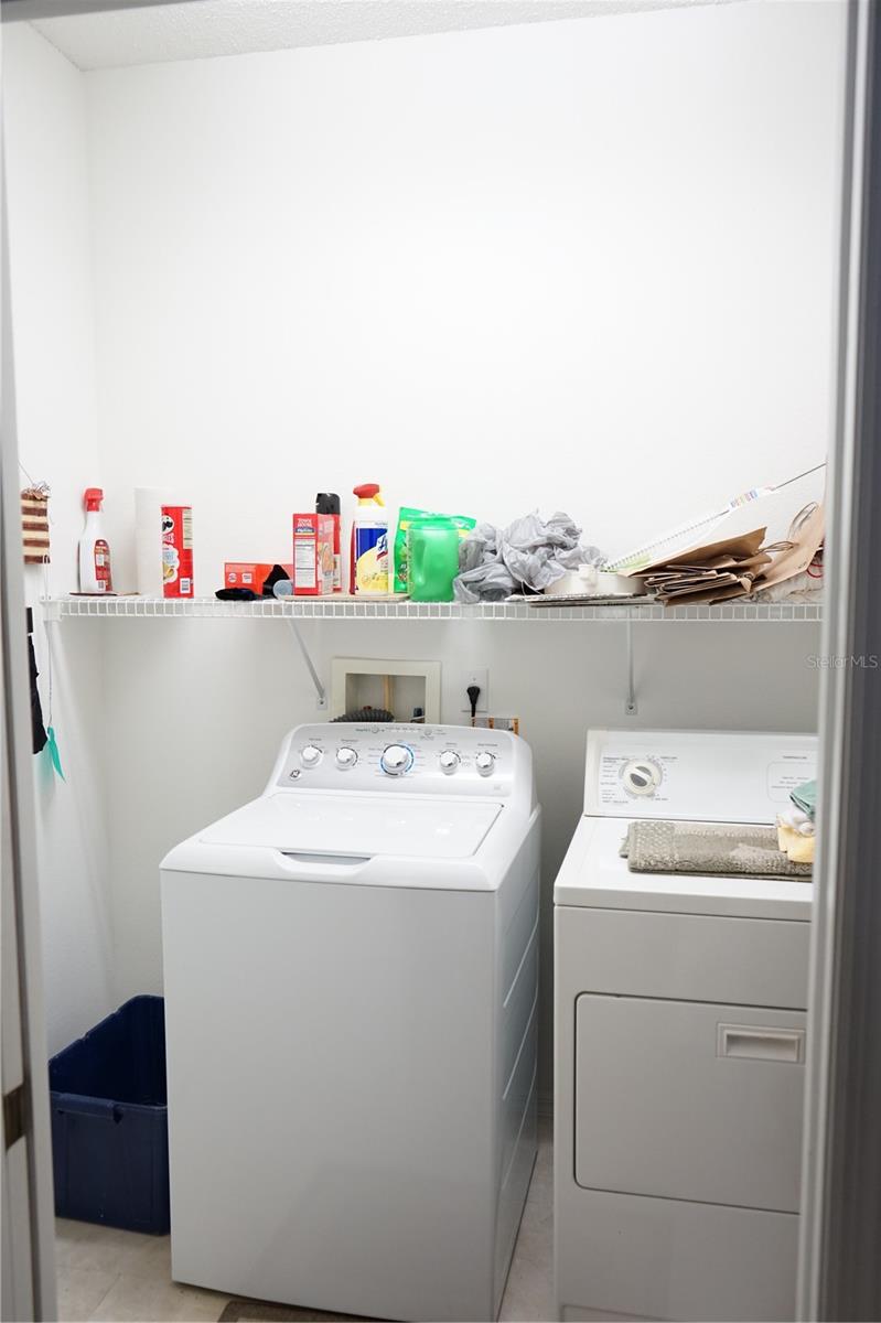 laundry goes out to garage from kitchen