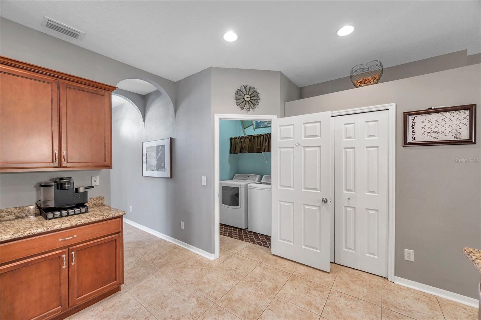 Laundry off kitchen thru entry off garage