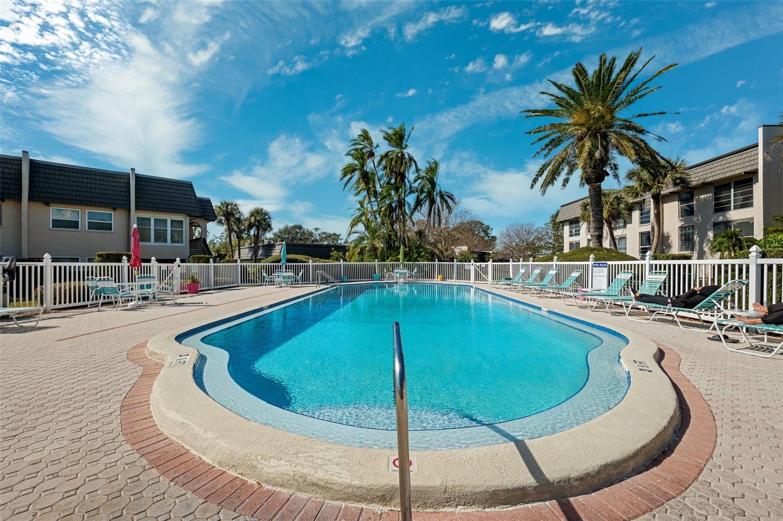 Pool and Jacuzzi With Bathrooms and Showers